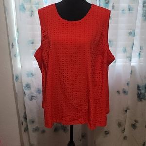 Orange top with geometric shapes